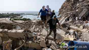 Father and son rescued after four days trapped beneath Venezuela earthquake rubble