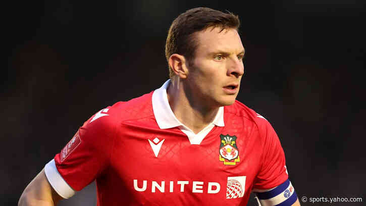 Where does Mullin rank among Wrexham greats?