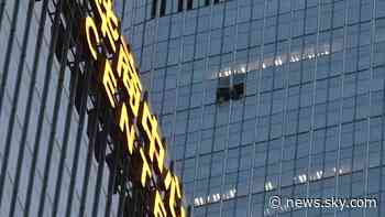 Thirteen injured and pilot killed as plane hits Beijing's tallest building