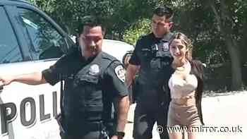 Sisters grin and giggle as they're arrested after allegedly killing mum-of-five in brutal Texas stabbing