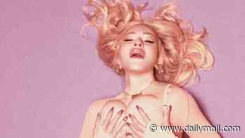 Madonna, 67, grabs her chest as she poses in a corset and fishnet tights in provocative new shoot for Vogue Italia