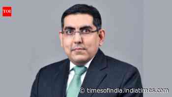 Who is Puneet Sharma, the Axis Bank CFO who has resigned?