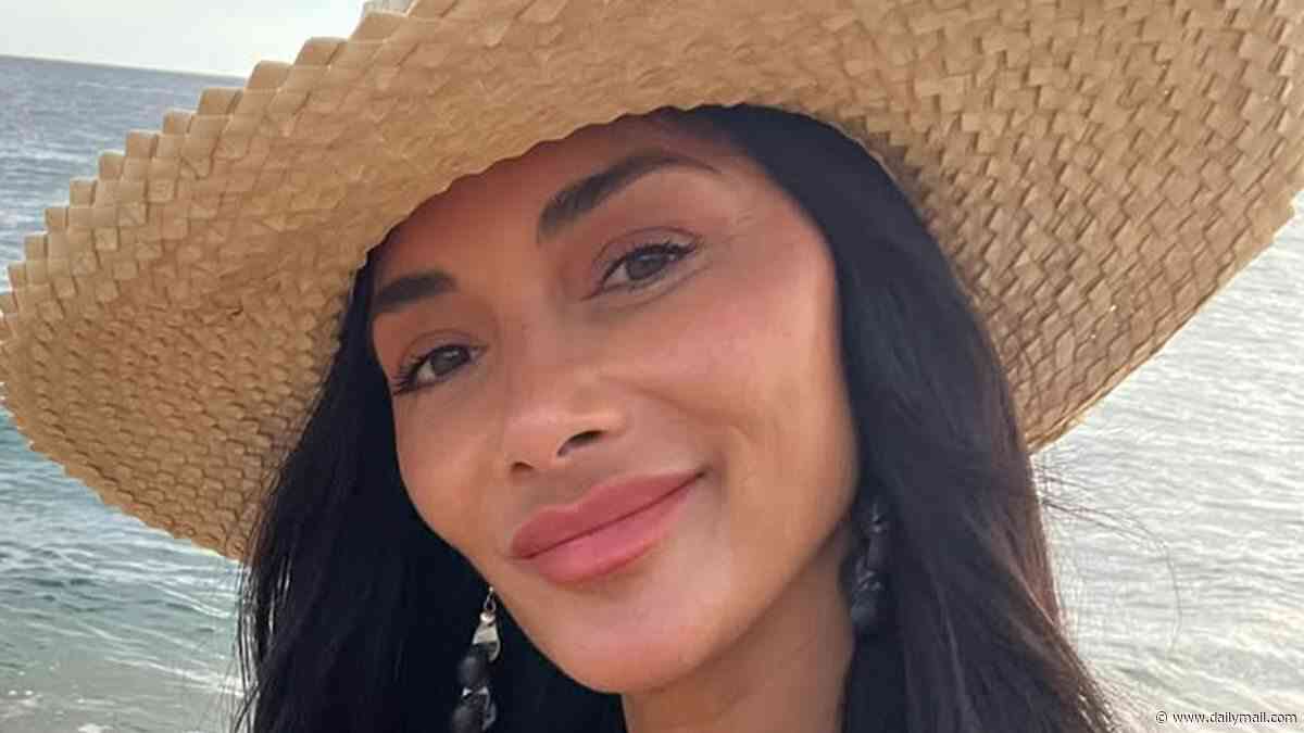 Nicole Scherzinger shows off her toned figure in a turquoise bikini as she hits the beach in Hawaii on her 48th birthday