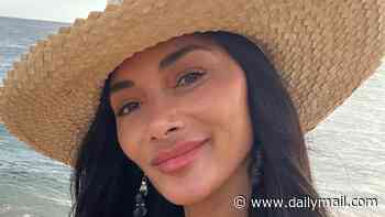 Nicole Scherzinger shows off her toned figure in a turquoise bikini as she hits the beach in Hawaii on her 48th birthday
