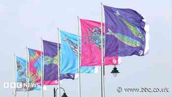 Summer flags painted using fish printing technique