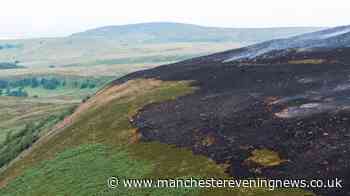 Wildfire on Tintwistle Moor rages on for fifth day as helicopter footage shows smouldering ground