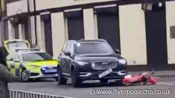 Man injured in police crash as Liverpool road cordoned off