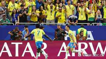 Brazil ekes out win over Japan late in injury time, overcoming first-half deficit