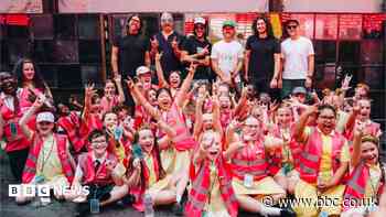 Schoolchildren perform for Foo Fighters ahead of stadium show