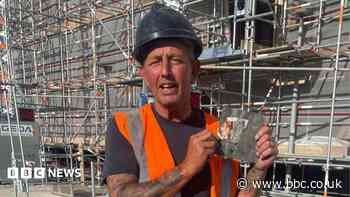 Roofer finds photo of son he hid under slates in 2002