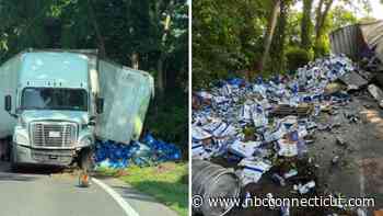 Tractor-trailer overturns in Salisbury, spilling beer cans onto roadway