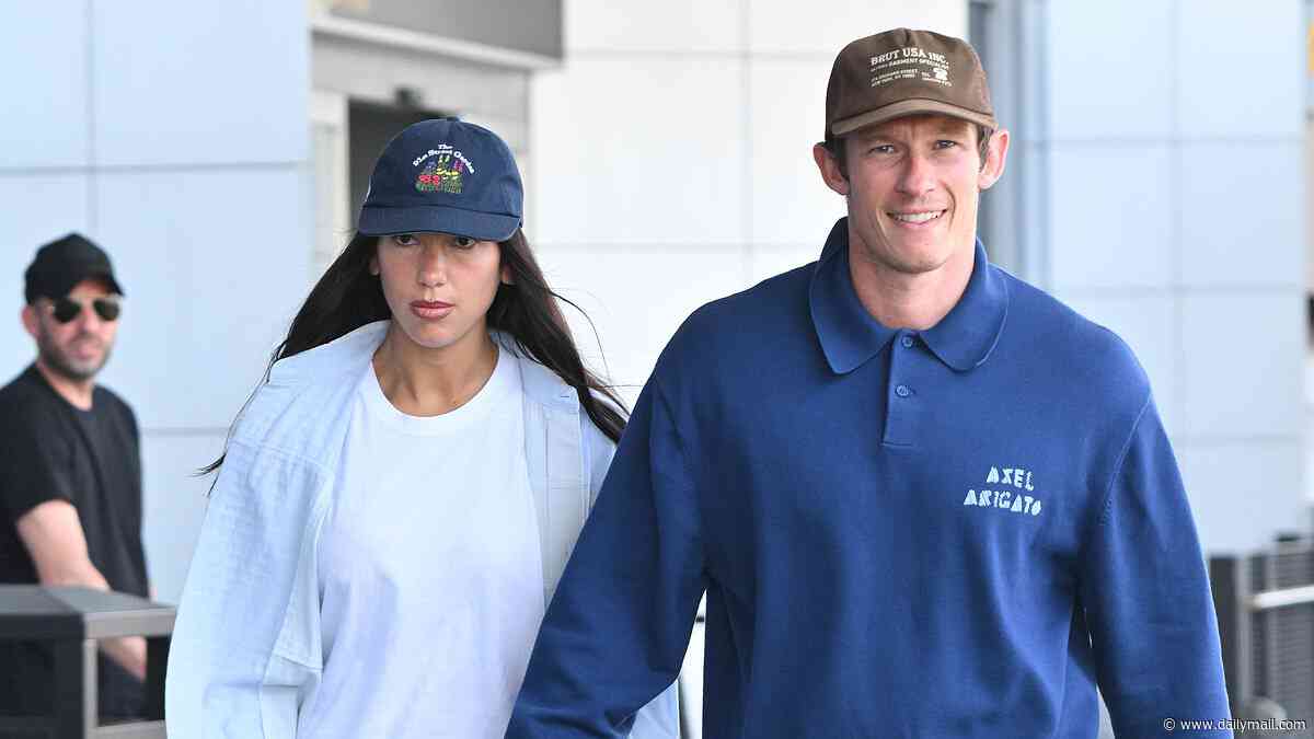 Dua Lipa and Callum Turner look every inch the loved-up newlyweds as they touch down in New York after romantic Italian honeymoon