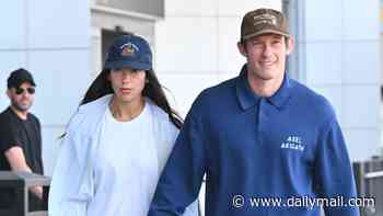 Dua Lipa and Callum Turner look every inch the loved-up newlyweds as they touch down in New York after romantic Italian honeymoon