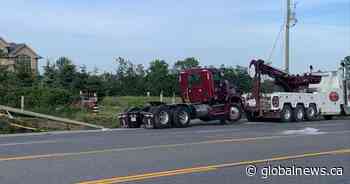 Collision with transport truck sends 3 to hospital with serious injuries