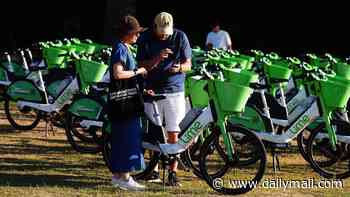 Scourge of the e-bikes at Wimbledon: Council threatens to seize abandoned bicycles after hundreds of fans use them to join the Queue