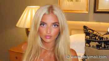 Katie Price brands daughter Princess 'a real life Barbie doll' as she poses with a bottle of champagne while celebrating her 19th birthday