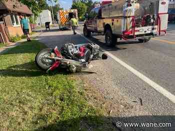 Motorcyclist crashes to avoid car making left turn