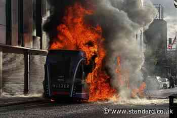 Man appears in court charged over bus fire during Belfast riots