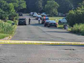 Road closed, police tape up near home where boy vanished in Menands