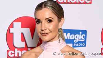 Helen Skelton is all legs as she puts on flirty display in black swimsuit