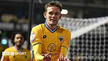 Dons midfielder Maycock signs two-year extension
