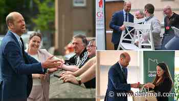 Royal Mail? Prince William mucks in at homeless charity by delivering IKEA chair up three flights of stairs!