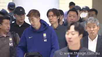 South Korea players booed at airport