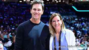 WNBA boss gets relentlessly booed amid Caitlin Clark uproar... after cozying up to Tom Brady for photo-op