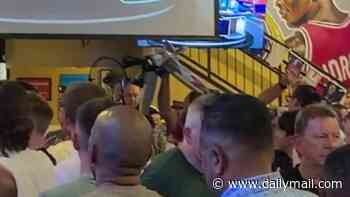 England fans hit Atlanta: Travelling Three Lions supporters taunt eliminated Germany with inflatable spitfires, mock the Tartan Army and do the CONGA ahead of World Cup clash with DR Congo