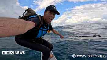Man powered by swell rides waves for 250 miles