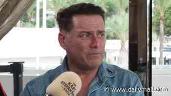 Karl Stefanovic breaks down over wife's reaction to his being 'sacked' from Today in interview with Piers Morgan aboard luxury yacht - as the two divisive figures commiserate over being punted from breakfast TV