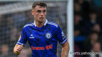 Boston sign midfielder McBride after Rochdale exit