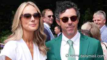 Rory McIlroy and Erica Stoll take Wimbledon: Golf star dons Masters jacket as he's joined by his wife in SW19 after moving from the United States to £9m mega-mansion in Surrey