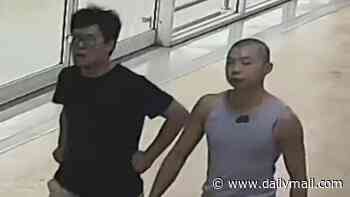 Footage emerges of accused people smugglers - as it's revealed boatload of alleged illegal Chinese arrivals to Australia spent hours going to a supermarket and a pub before they were found