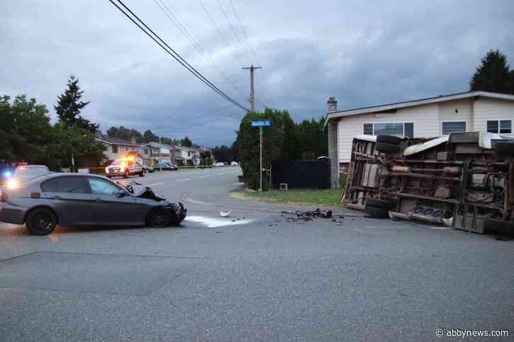 Private bus flips after collision with car in Abbotsford