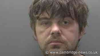 Man held stolen knife to shop manager's throat