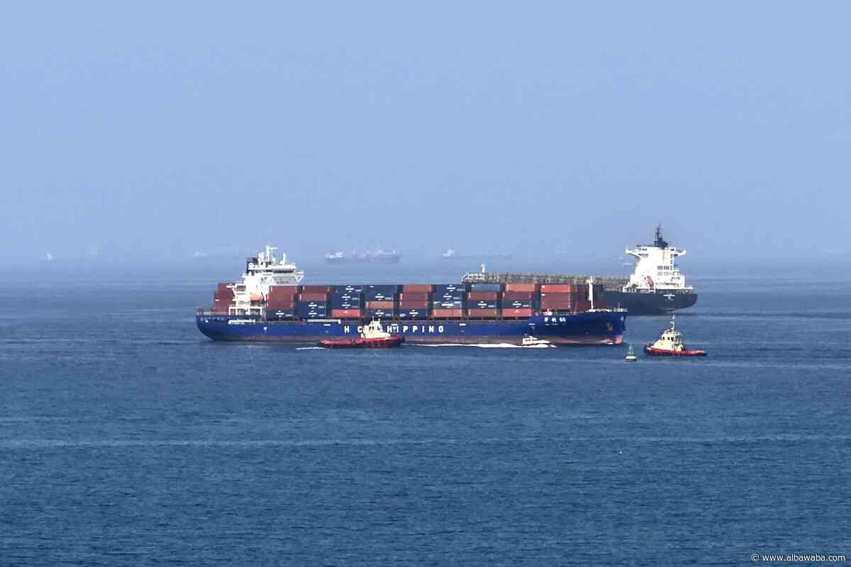 Foreign cargo ship runs aground in Strait of Hormuz as Iran defends shipping controls