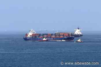 Foreign cargo ship runs aground in Strait of Hormuz as Iran defends shipping controls
