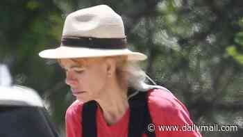 Star of hit sitcom and soap opera who posed for Playboy is unrecognizable on rare outing... can you guess who?