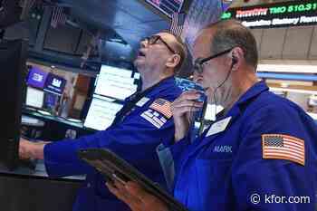 Most US stocks rise, but drops for tech keep Wall Street in check