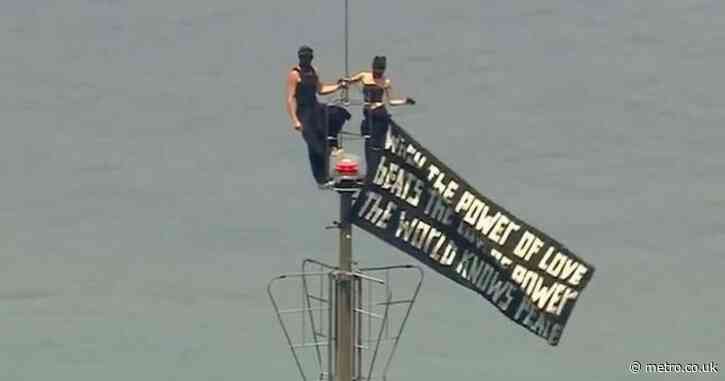 Daredevil couple arrested after 1,400ft high proposal on top of Empire State Building