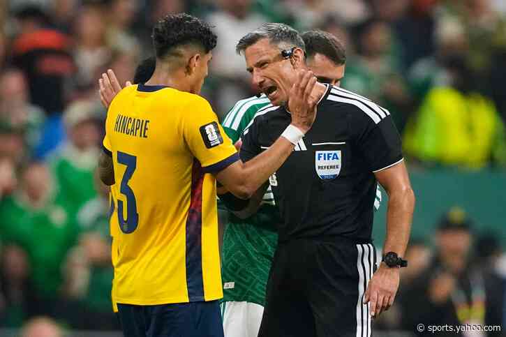 Why are red cards given to World Cup players covering their mouths?