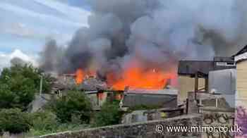 Huge blaze breaks out next to M&S store as locals told to 'stay inside'