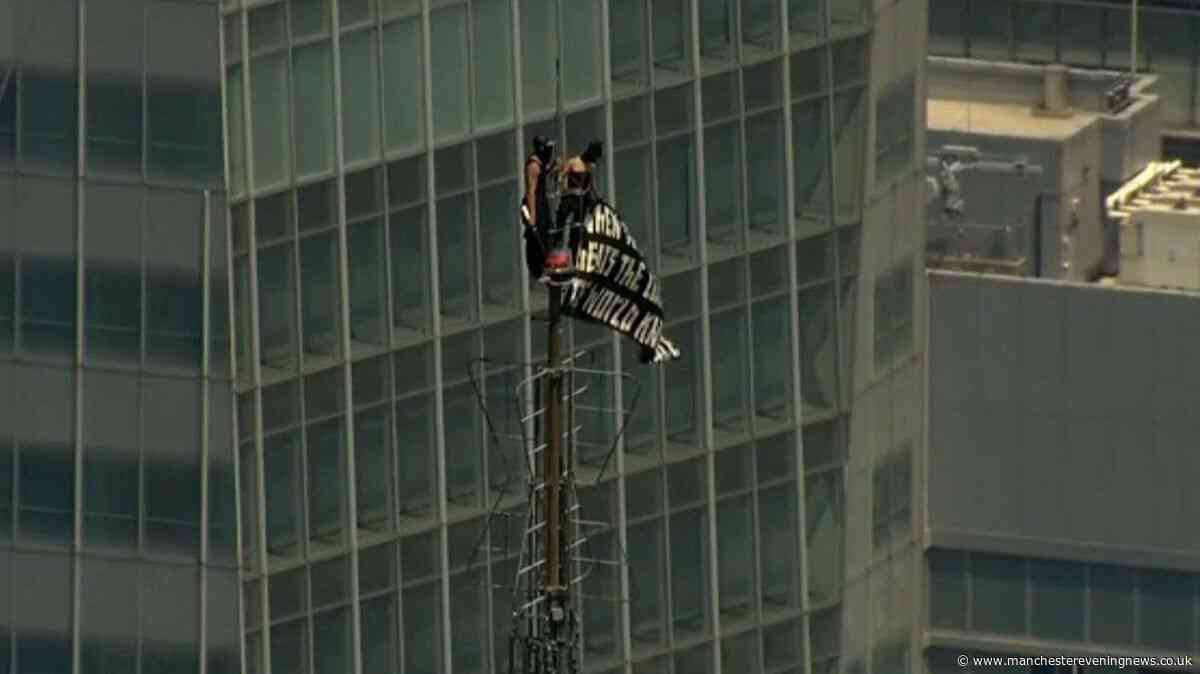 Two arrested after climbing Empire State Building in 'marriage proposal'