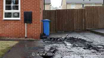 Window smashed and driveway left burnt after car set alight in 'targeted attack'