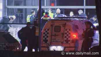 Teenager found bleeding to death outside a hospital in Melbourne - as police launch urgent investigation