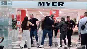 Wild brawl erupts at Sydney shopping centre after alleged shoplifting incident - with pram caught in the chaos