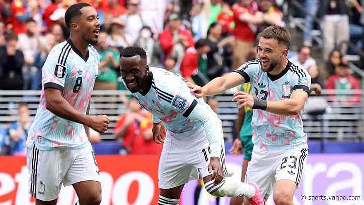 Raskin helps Belgium stage comeback to book last-16 place