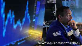 Wall Street closes lower as tech shares slip