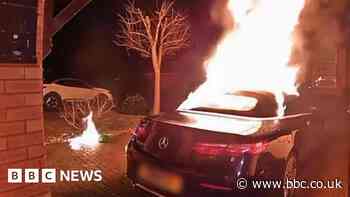 Watch: Arsonist sets fire to Mercedes on driveway